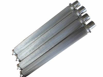 Four sintered stainless steel pleated filter cylinders with screw flanges.